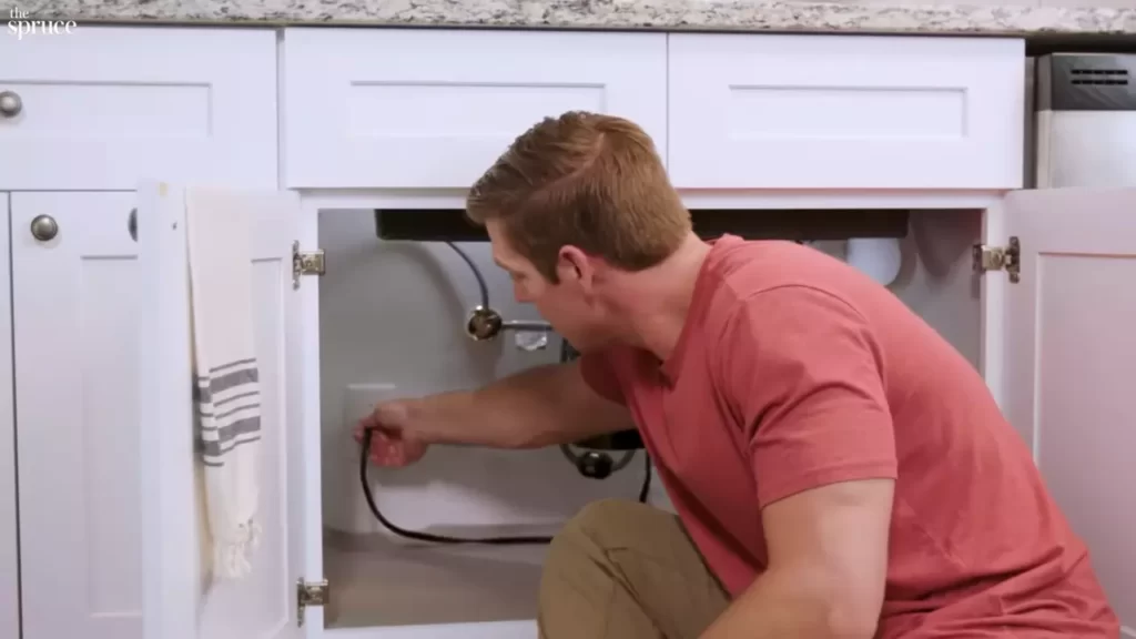 How to Install a Garbage Disposal With a Dishwasher